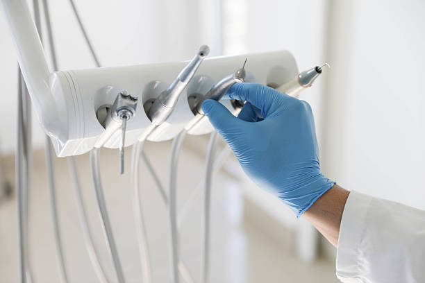Professional Tooth Extraction technician working in McElhattan, PA